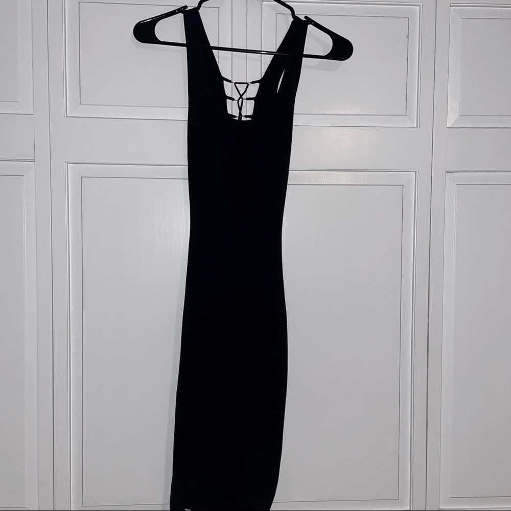 Black mini dress with gold corset back